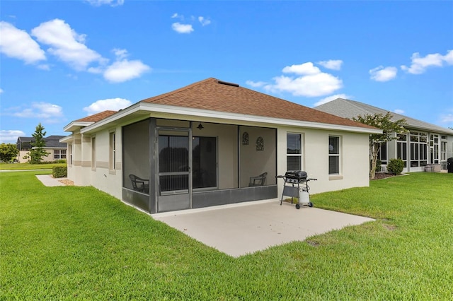 5715 Illumination Ln, Leesburg, FL 34748 - back of house featuring a sunroom, stucco siding, a yard, and roof with shingles