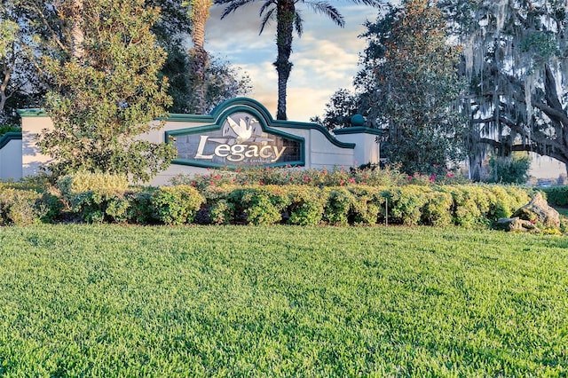 5715 Illumination Ln, Leesburg, FL 34748 - community / neighborhood sign featuring a lawn