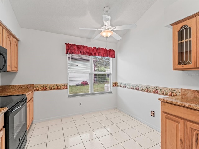 1142 W Boone Ct, The Villages, FL 32159 - kitchen with black appliances, a ceiling fan, glass insert cabinets, light stone countertops, and a textured ceiling