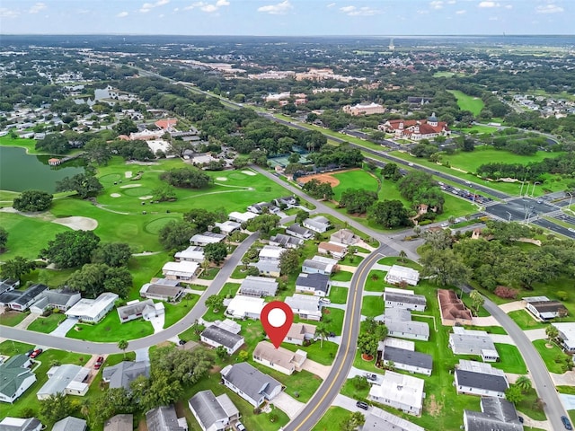 1142 W Boone Ct, The Villages, FL 32159 - view of property location with a nearby body of water, nearby suburban area, and a local golf course