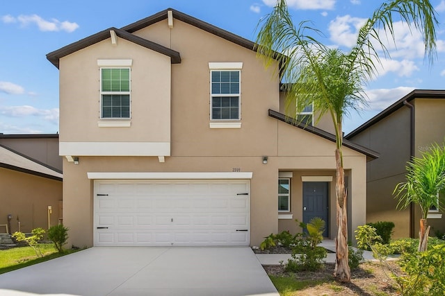 2139 Stellar Brilliance Way, Lutz, FL 33558 - view of front of property with stucco siding, driveway, and an attached garage