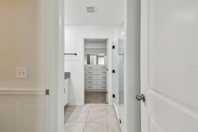 2139 Stellar Brilliance Way, Lutz, FL 33558 - bathroom featuring vanity, a shower stall, and tile patterned flooring