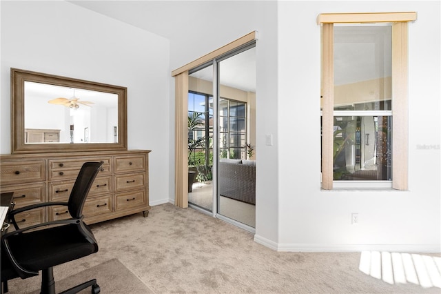 5740 Bounty Cir, Tavares, FL 32778 - home office with carpet floors and ceiling fan