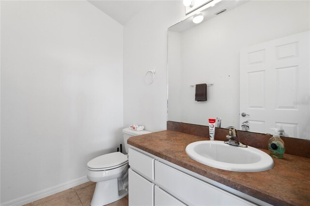 5740 Bounty Cir, Tavares, FL 32778 - half bathroom featuring tile patterned floors and vanity