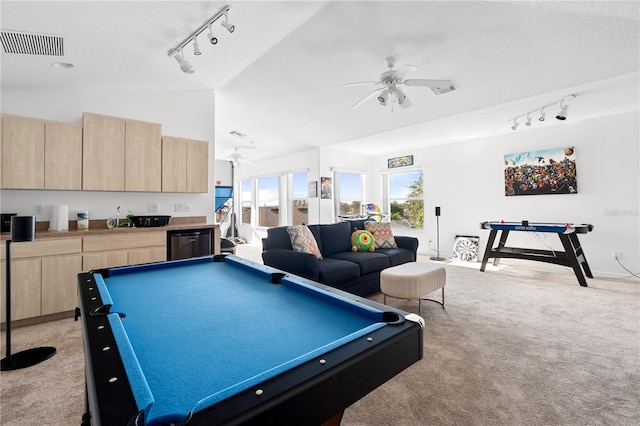 5740 Bounty Cir, Tavares, FL 32778 - rec room with rail lighting, a ceiling fan, light carpet, vaulted ceiling, and billiards