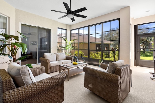 5740 Bounty Cir, Tavares, FL 32778 - sunroom / solarium with ceiling fan, outdoor lounge area, and carpet flooring