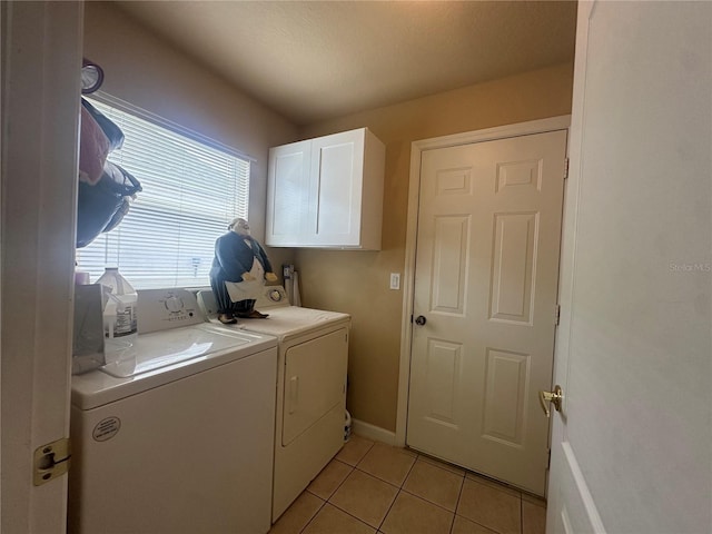15509 Markham Dr, Clermont, FL 34714 - washroom featuring washer and clothes dryer, cabinet space, and light tile patterned flooring
