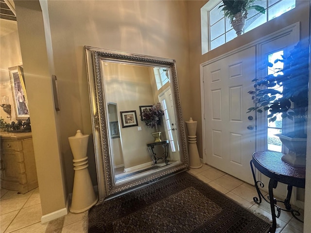 15509 Markham Dr, Clermont, FL 34714 - entrance foyer featuring light tile patterned floors, healthy amount of natural light, and a high ceiling