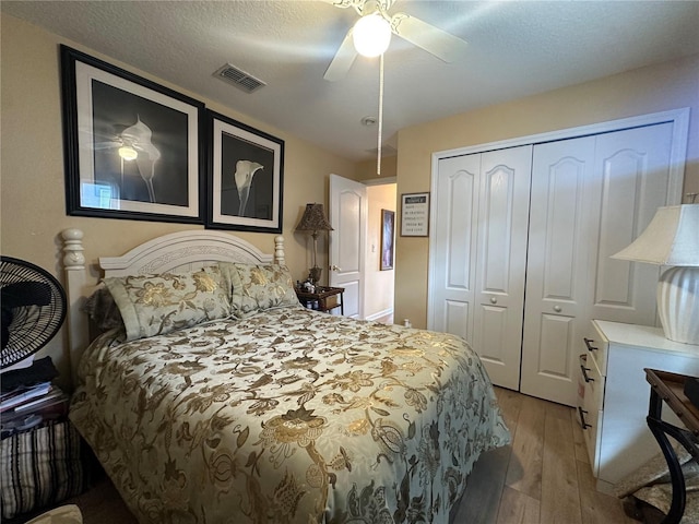 15509 Markham Dr, Clermont, FL 34714 - bedroom featuring light wood finished floors, a closet, and ceiling fan