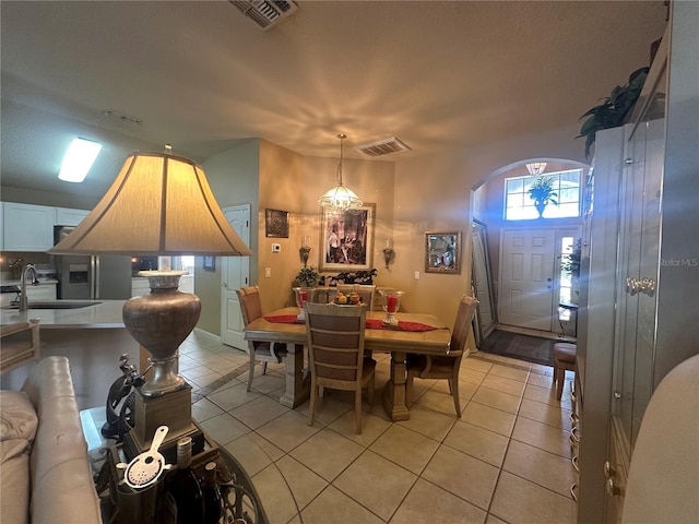 15509 Markham Dr, Clermont, FL 34714 - dining room featuring light tile patterned flooring and arched walkways
