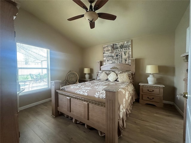15509 Markham Dr, Clermont, FL 34714 - bedroom featuring light wood-style floors, vaulted ceiling, and ceiling fan