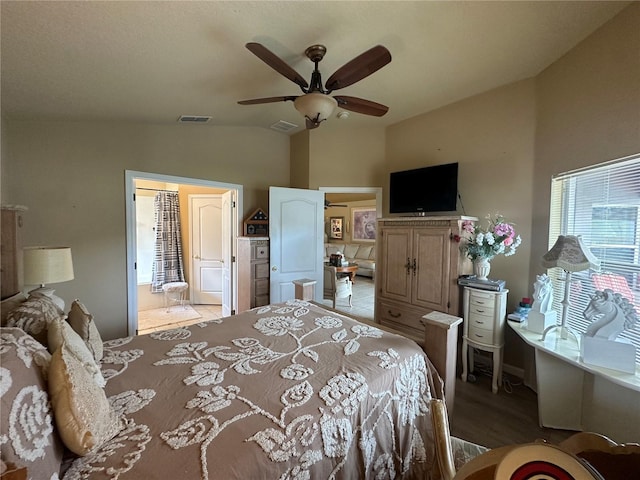 15509 Markham Dr, Clermont, FL 34714 - bedroom featuring lofted ceiling, light wood-style flooring, and a ceiling fan
