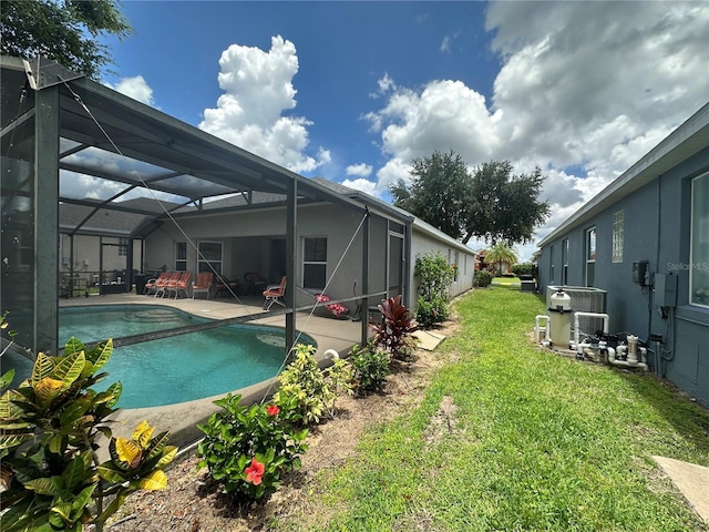 15509 Markham Dr, Clermont, FL 34714 - swimming pool with a lawn, a patio, and glass enclosure