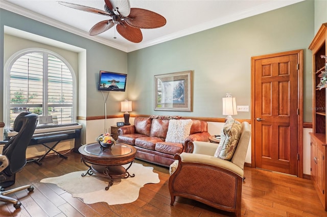 2512 Baywater Rd, Tavares, FL 32778 - living area with hardwood / wood-style flooring, crown molding, a ceiling fan, and a desk