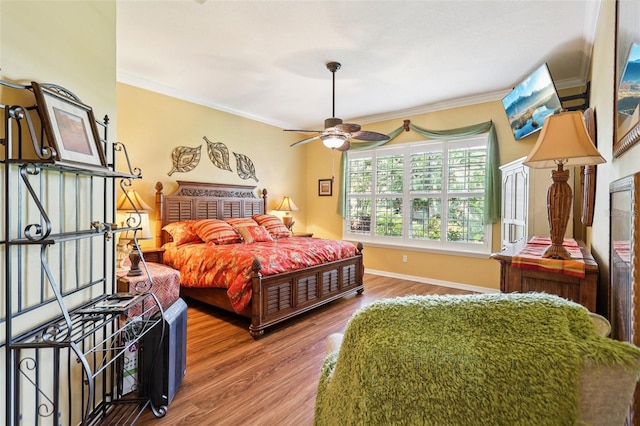 2512 Baywater Rd, Tavares, FL 32778 - bedroom featuring ornamental molding, wood finished floors, and a ceiling fan