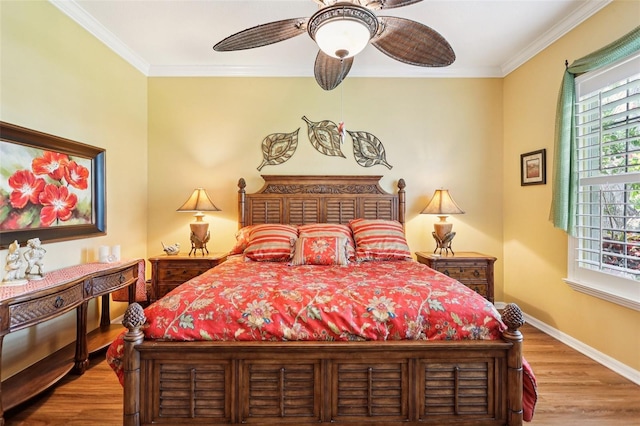 2512 Baywater Rd, Tavares, FL 32778 - bedroom featuring wood finished floors, ornamental molding, and a ceiling fan