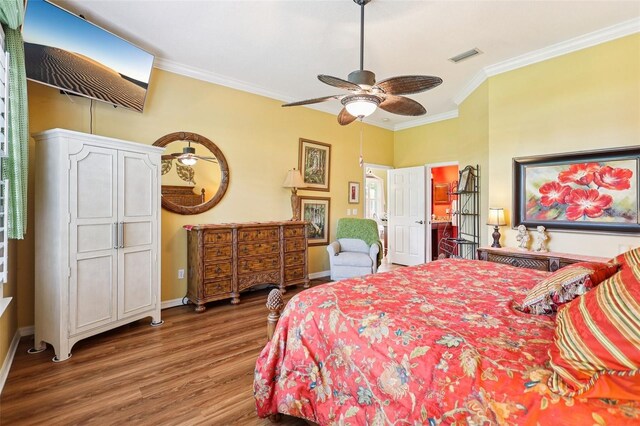 2512 Baywater Rd, Tavares, FL 32778 - bedroom with wood finished floors, ornamental molding, and ceiling fan