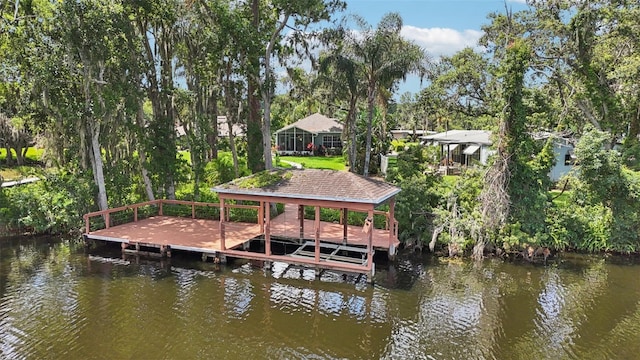 2512 Baywater Rd, Tavares, FL 32778 - dock area with a water view, boat lift, and view of scattered trees