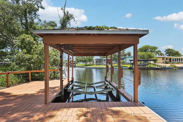 2512 Baywater Rd, Tavares, FL 32778 - dock area featuring boat lift and a water view