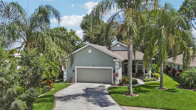 2512 Baywater Rd, Tavares, FL 32778 - view of front of home with stucco siding, concrete driveway, a front yard, an attached garage, and roof with shingles