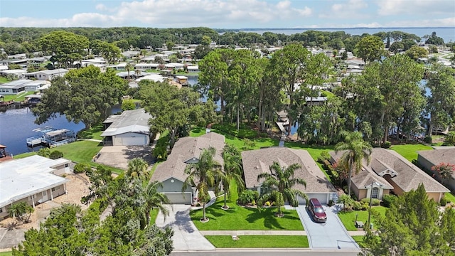 2512 Baywater Rd, Tavares, FL 32778 - aerial perspective of suburban area featuring a nearby body of water