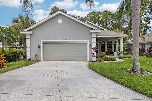2512 Baywater Rd, Tavares, FL 32778 - ranch-style house featuring stucco siding, concrete driveway, a front yard, and a garage