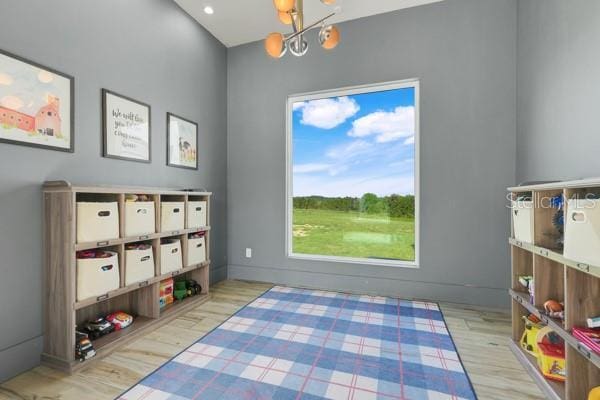 10711 County Road 561, Clermont, FL 34711 - rec room featuring a chandelier and wood finished floors