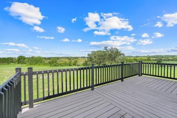 10711 County Road 561, Clermont, FL 34711 - wooden deck featuring a yard