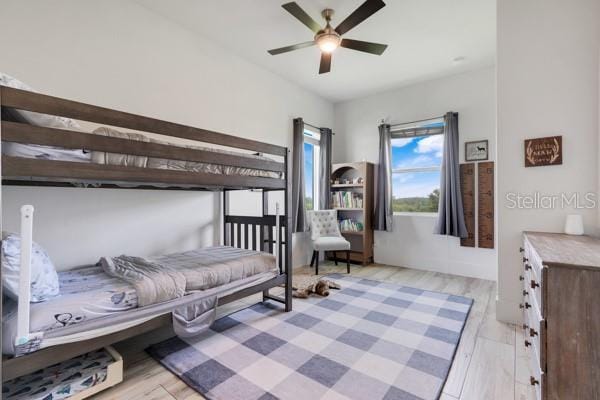 10711 County Road 561, Clermont, FL 34711 - bedroom featuring light wood-style floors