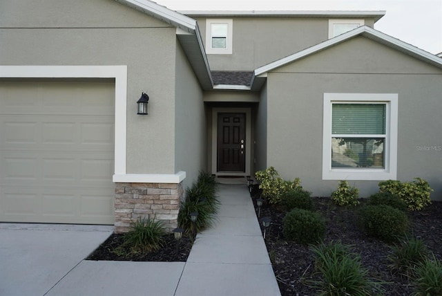 1138 Calico Pointe Cir, Groveland, FL 34736 - property entrance featuring stucco siding and stone siding