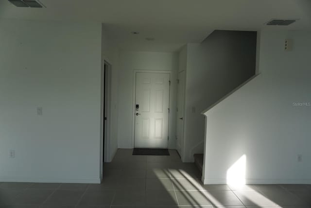 1138 Calico Pointe Cir, Groveland, FL 34736 - hallway featuring tile patterned flooring and baseboards