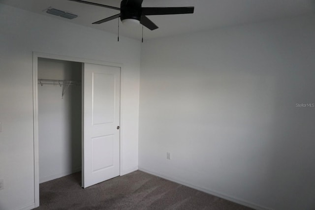1138 Calico Pointe Cir, Groveland, FL 34736 - unfurnished bedroom with carpet floors, a closet, and ceiling fan
