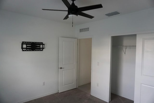 1138 Calico Pointe Cir, Groveland, FL 34736 - unfurnished bedroom featuring carpet, a closet, and ceiling fan