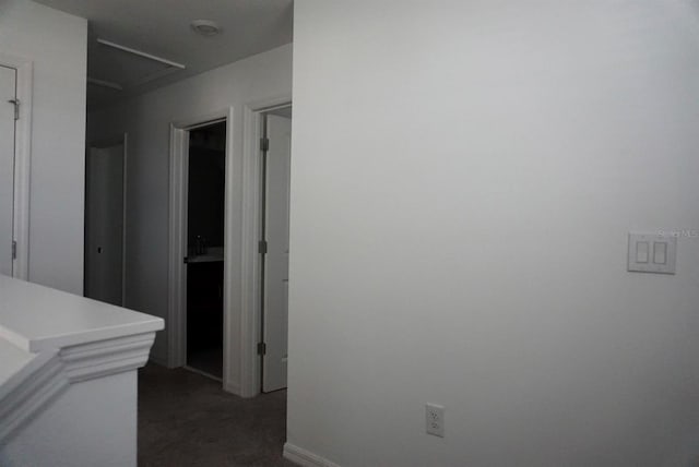 1138 Calico Pointe Cir, Groveland, FL 34736 - hall featuring attic access and dark carpet