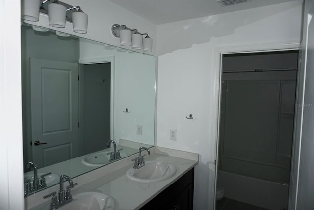 1138 Calico Pointe Cir, Groveland, FL 34736 - bathroom featuring double vanity and shower / bath combination