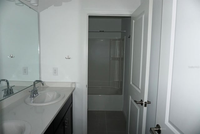 1138 Calico Pointe Cir, Groveland, FL 34736 - bathroom with double vanity, shower / tub combination, and tile patterned flooring