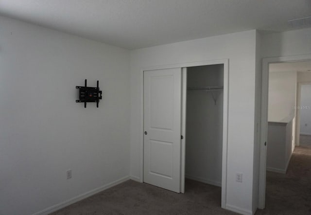 1138 Calico Pointe Cir, Groveland, FL 34736 - unfurnished bedroom featuring carpet and a closet