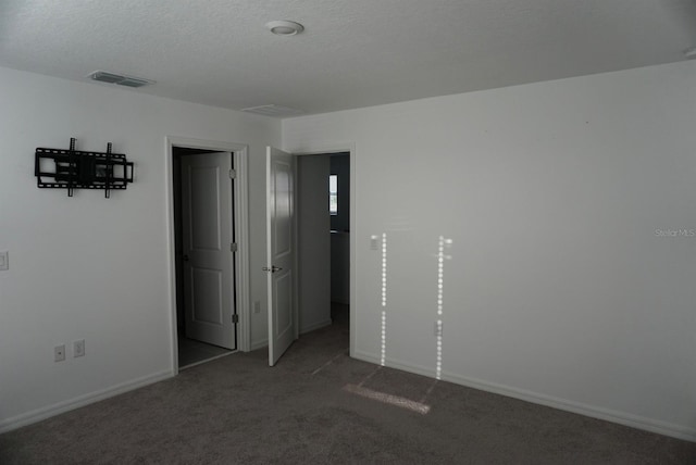 1138 Calico Pointe Cir, Groveland, FL 34736 - unfurnished bedroom featuring carpet and baseboards