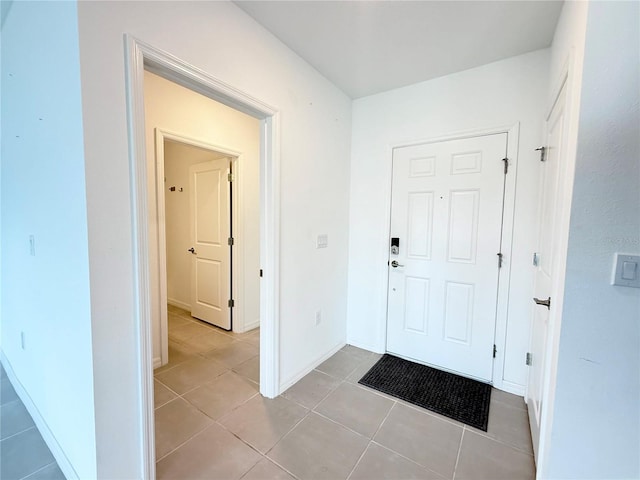 1138 Calico Pointe Cir, Groveland, FL 34736 - entrance foyer featuring light tile patterned floors and baseboards