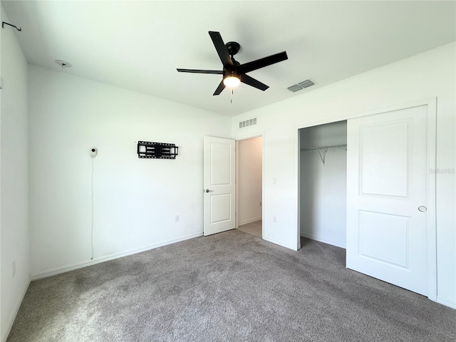 1138 Calico Pointe Cir, Groveland, FL 34736 - unfurnished bedroom featuring carpet floors, a closet, and ceiling fan