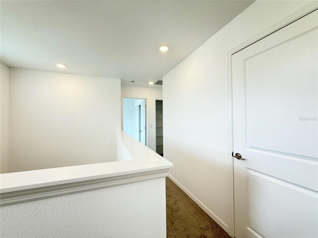 1138 Calico Pointe Cir, Groveland, FL 34736 - corridor with dark colored carpet and recessed lighting