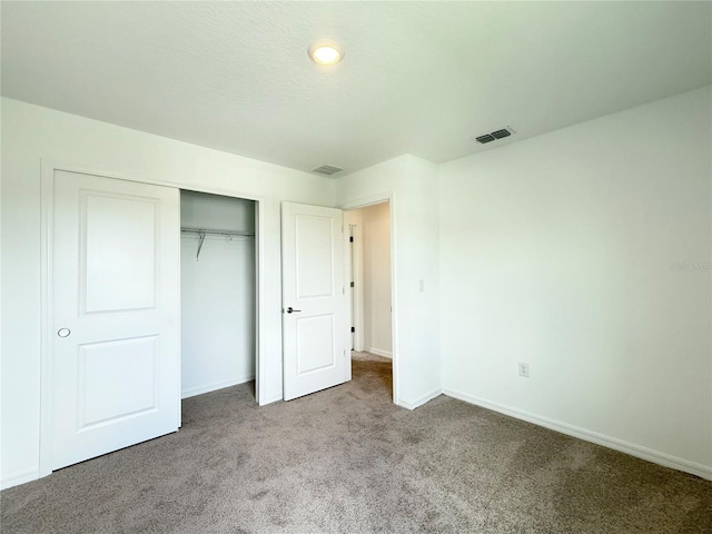 1138 Calico Pointe Cir, Groveland, FL 34736 - unfurnished bedroom with carpet floors and a closet