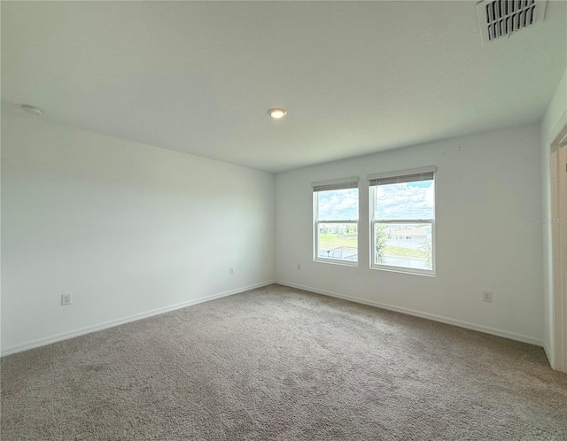 1138 Calico Pointe Cir, Groveland, FL 34736 - carpeted empty room featuring recessed lighting and a smoke detector