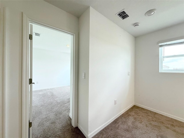1138 Calico Pointe Cir, Groveland, FL 34736 - carpeted spare room with baseboards and a smoke detector