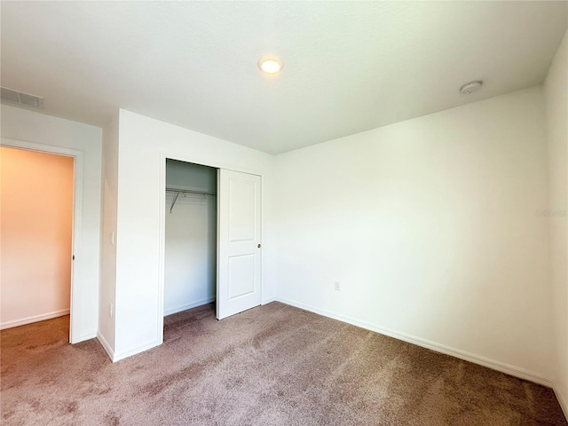 1138 Calico Pointe Cir, Groveland, FL 34736 - unfurnished bedroom with carpet flooring and a closet