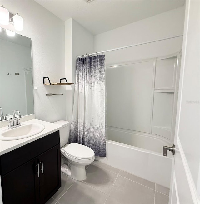 1138 Calico Pointe Cir, Groveland, FL 34736 - full bathroom featuring vanity, tile patterned floors, and shower / bathtub combination with curtain
