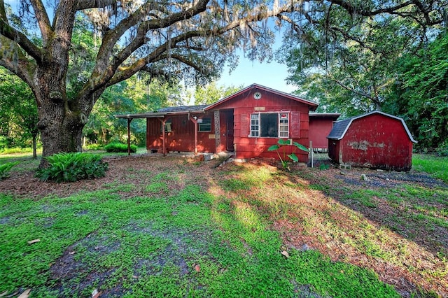 54544 Buckhorn Rd, Astor, FL 32102 - view of front facade with a storage unit