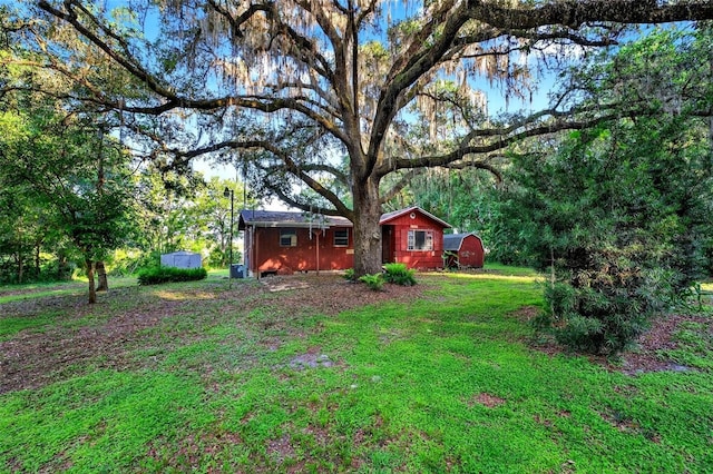 54544 Buckhorn Rd, Astor, FL 32102 - view of grassy yard featuring a shed