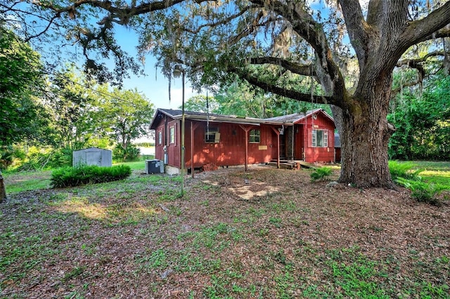 54544 Buckhorn Rd, Astor, FL 32102 - view of front facade with a storage shed and crawl space