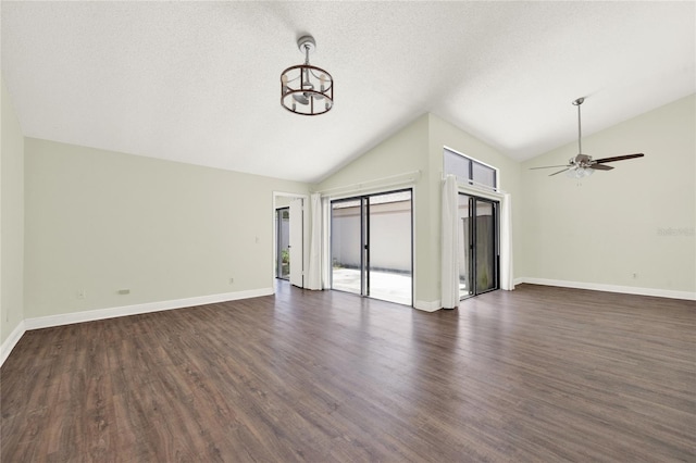 2815 Spyglass Cv, Longwood, FL 32779 - unfurnished living room with vaulted ceiling, a chandelier, ceiling fan, and dark wood-type flooring